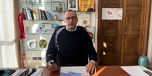 Ricci alla scrivania