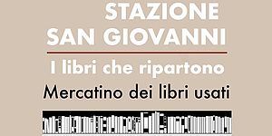 particolare locandina con testo e immagine scaffale con libri