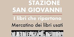 particolare locandina con testo e immagine scaffale con libri