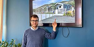 Pozzi con dietro il rendering dell'asilo