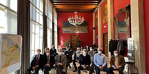 Ricci Pandolfi Donini con persone a sedere in sala Rossa
