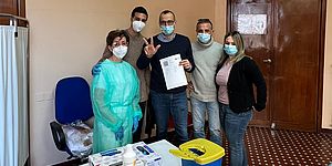 Ricci con operatori dei vacini