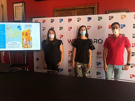 Morotti Mengucci Bonazzoli con sullo sfondo programma evento