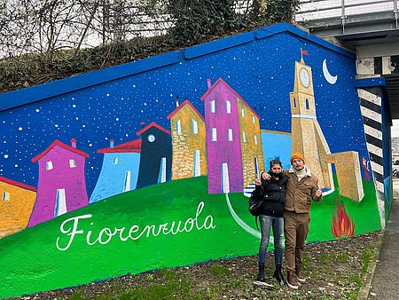 Murale rappresentate il borgo di fiorenzuola con Santini e De Stefani